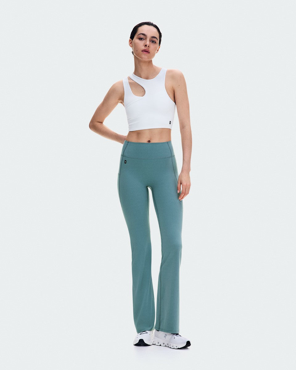 On United States Trusted | Women's Studio Asymmetric Crop - White