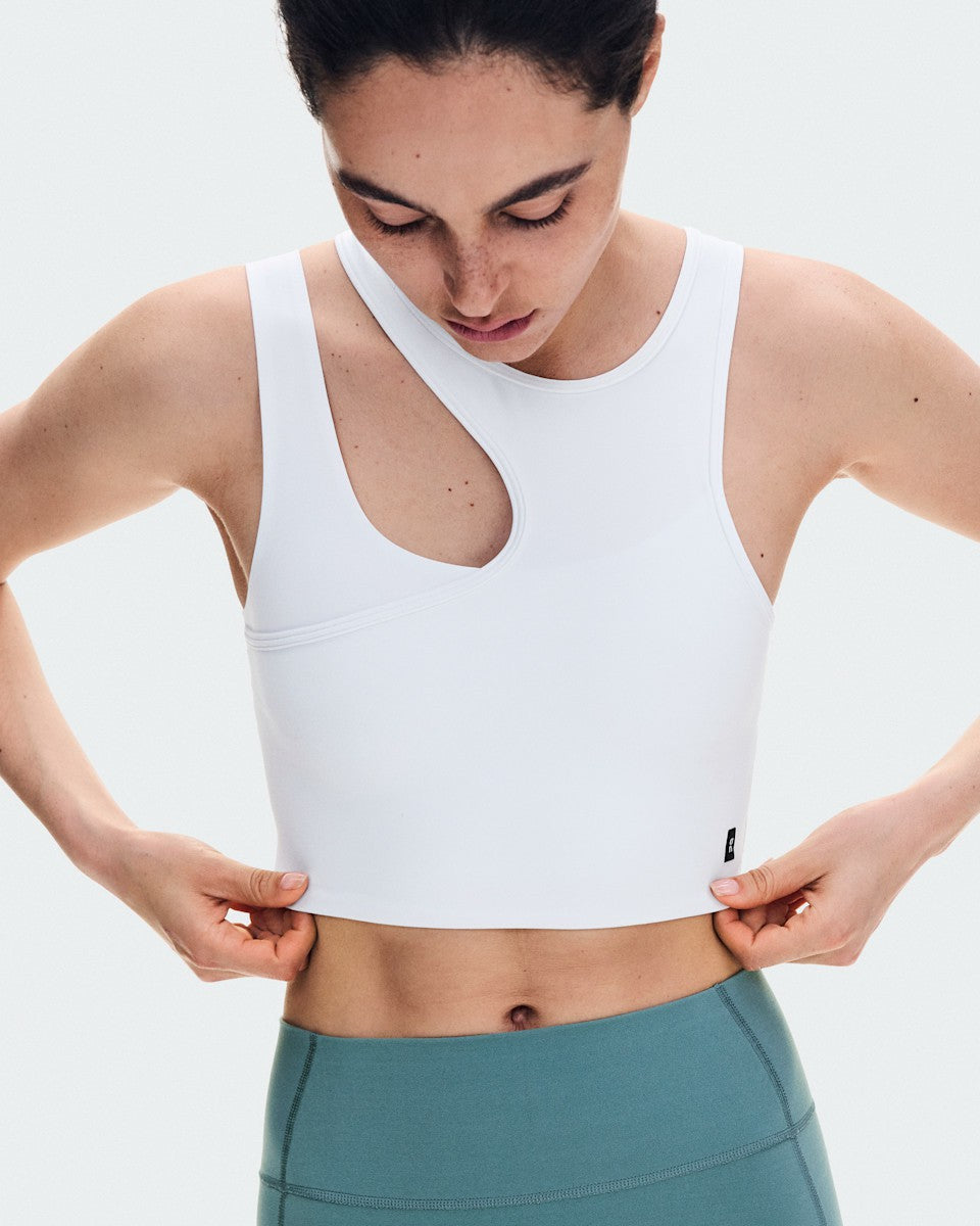 On United States Trusted | Women's Studio Asymmetric Crop - White