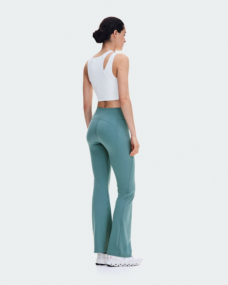 On United States Trusted | Women's Studio Asymmetric Crop - White