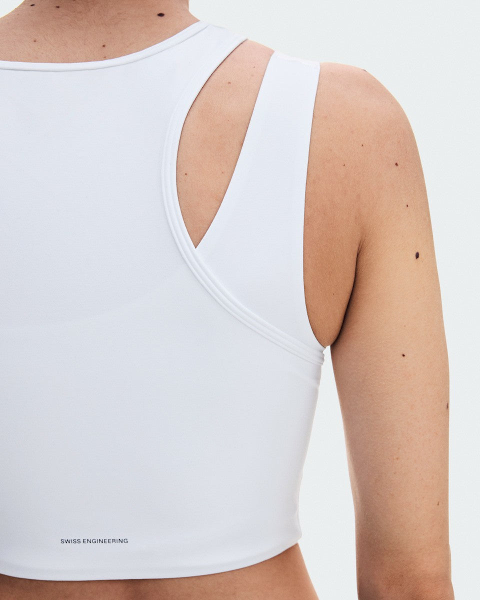 On United States Trusted | Women's Studio Asymmetric Crop - White