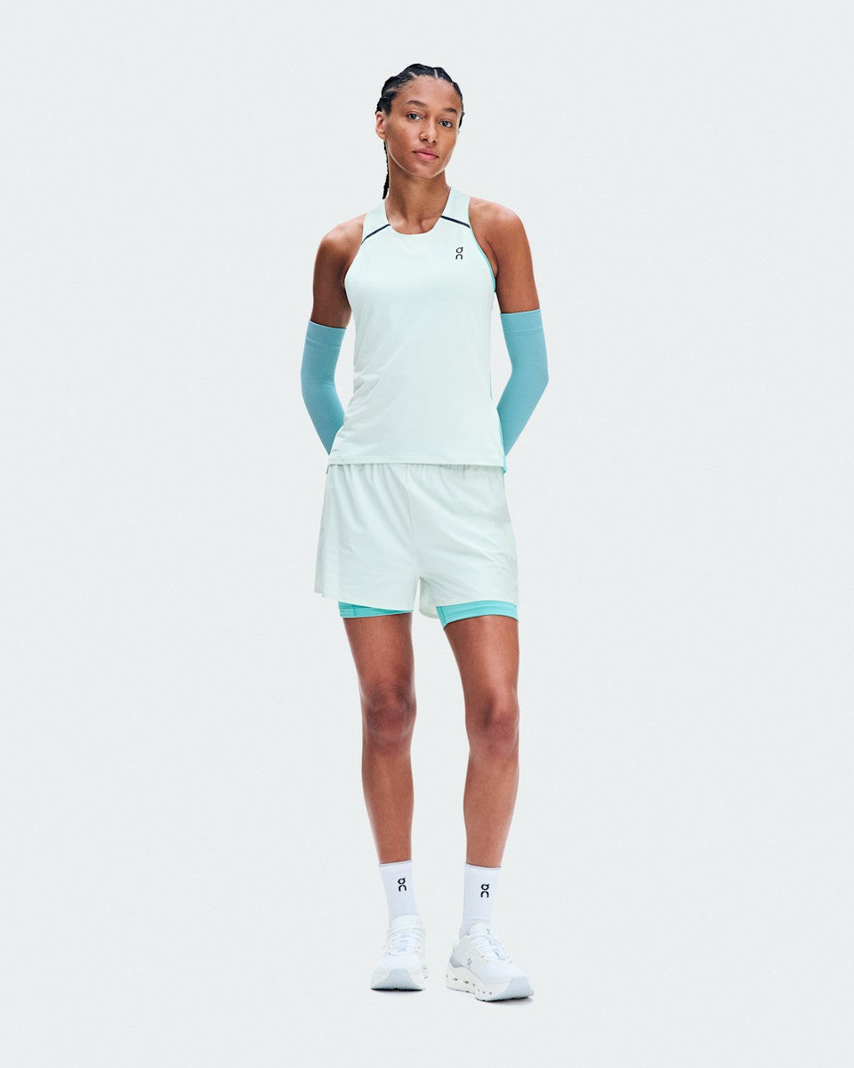 On United States Essential | Women's Performance Tank - Flurry/Aquamarine
