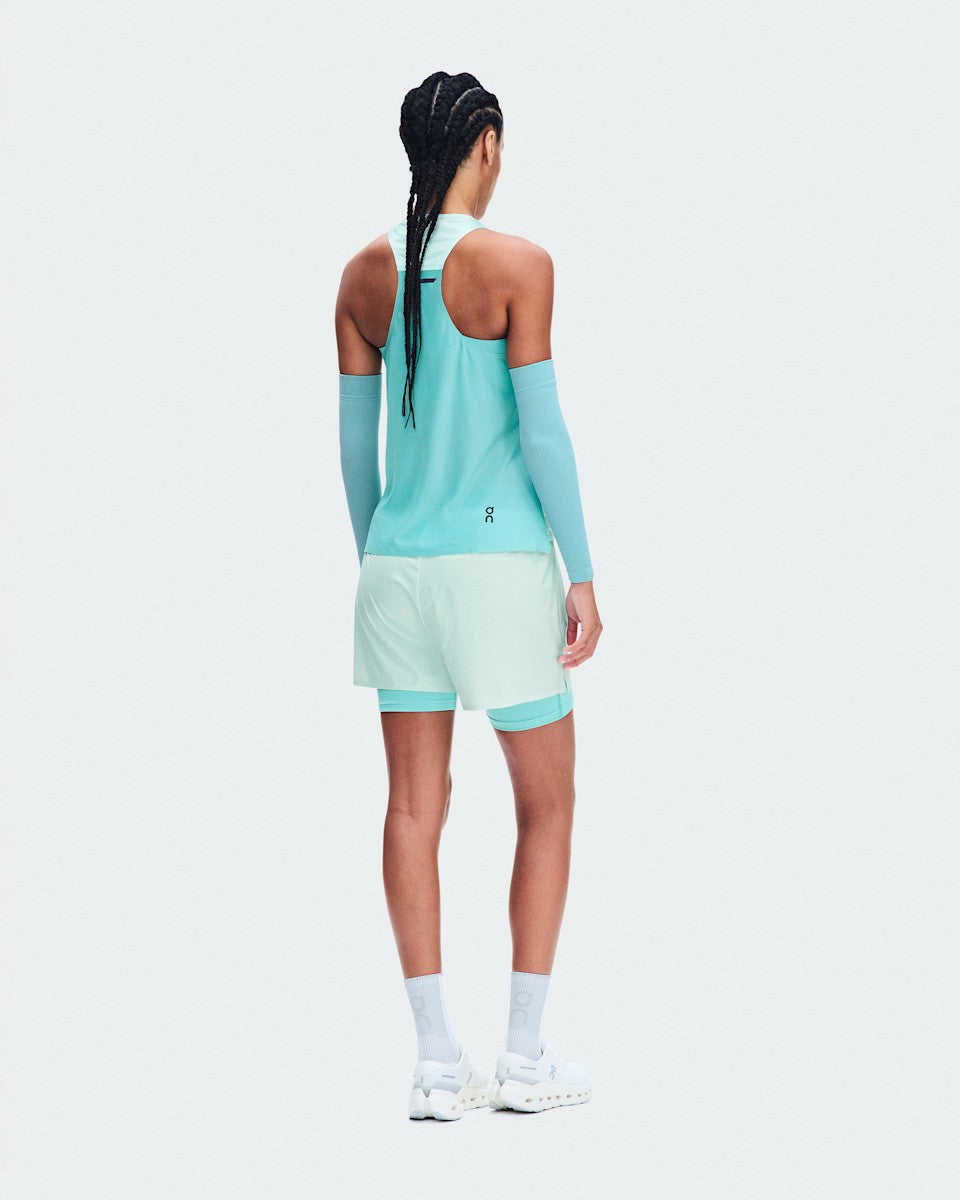 On United States Essential | Women's Performance Tank - Flurry/Aquamarine
