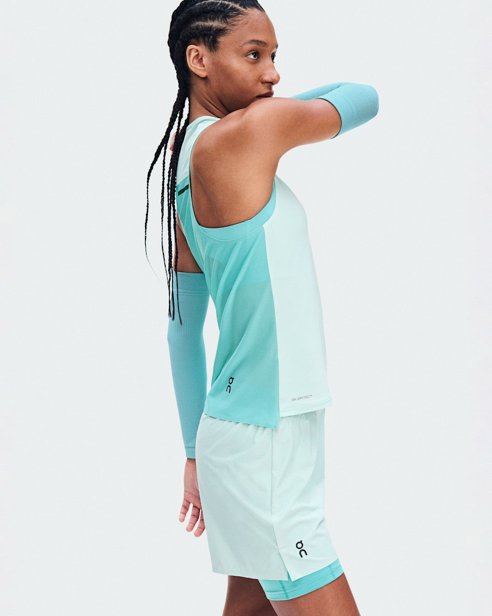 On United States Essential | Women's Performance Tank - Flurry/Aquamarine