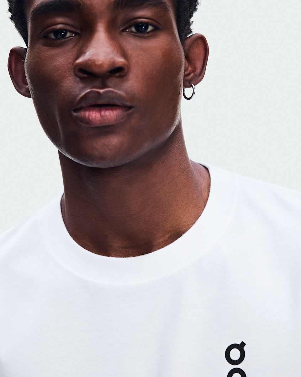 On United States Trusted | Men's Club-T Glow - White